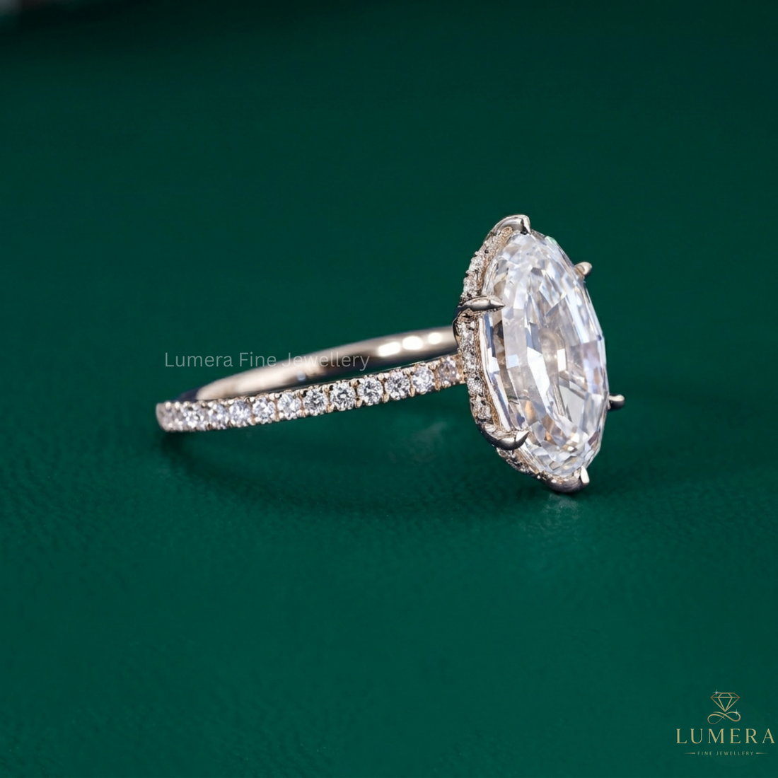 oval step cut diamond ring with hidden halo engagement ring.