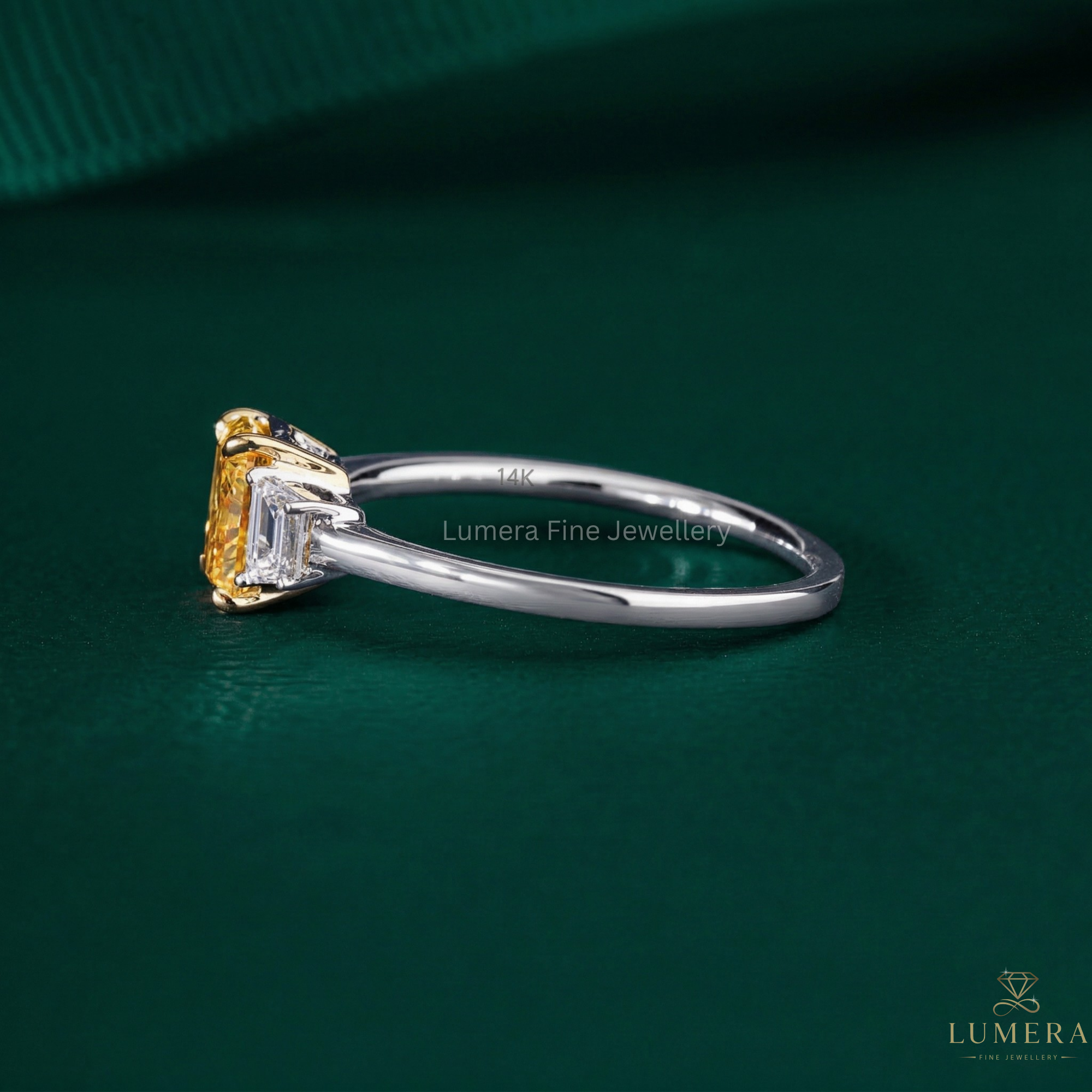 radiant diamond ring with radiant with trapezoid side stones.