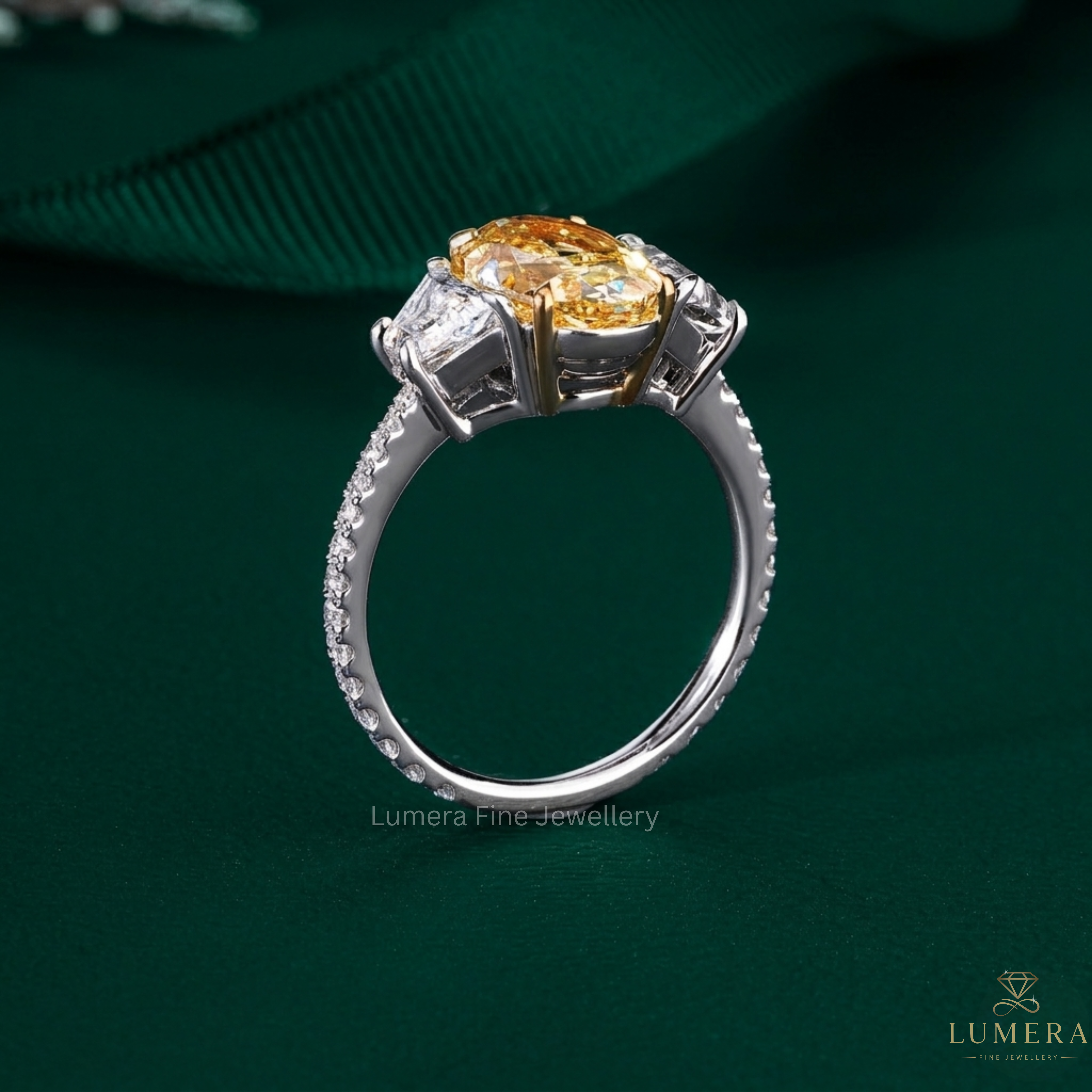 yellow color stone diamond ring in trapezoid side stone style.
