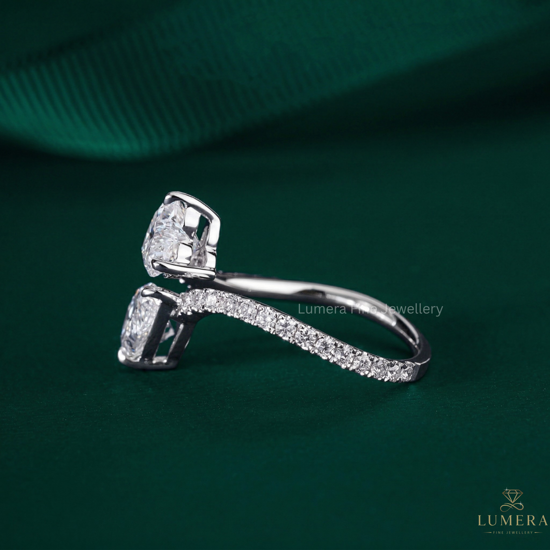 two stone ring in toi et moi ring heart and pear style.
