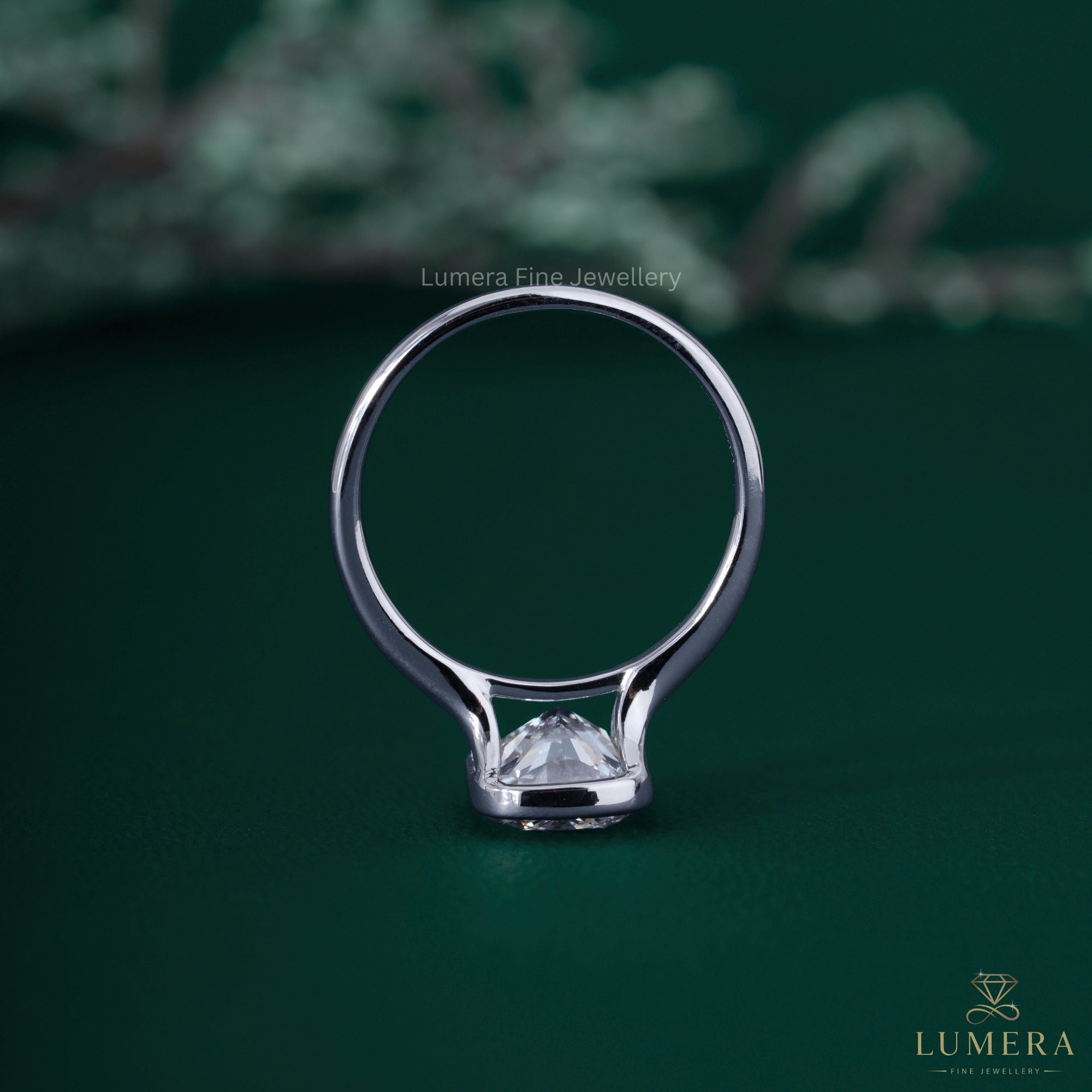Cushion ring with elongated cushion cut engagement ring.