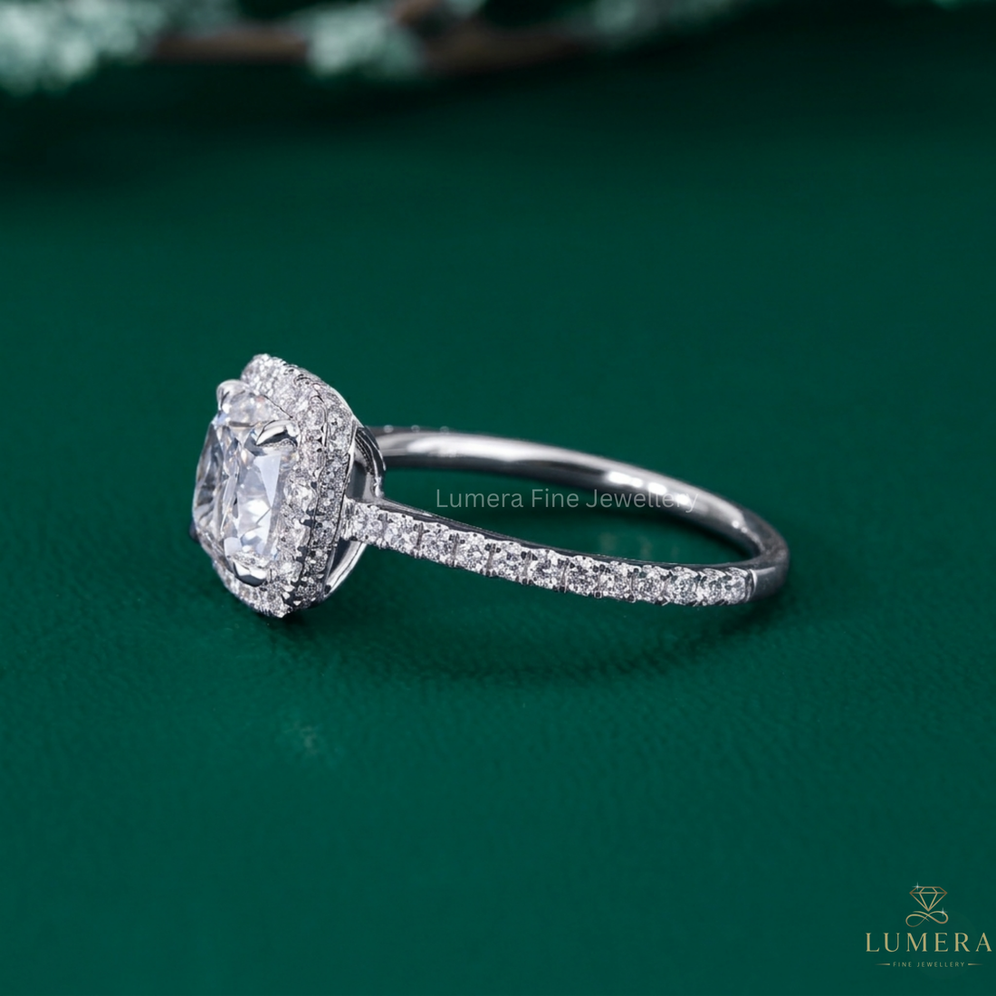cushion cut engagement ring with cathedral setting ring.