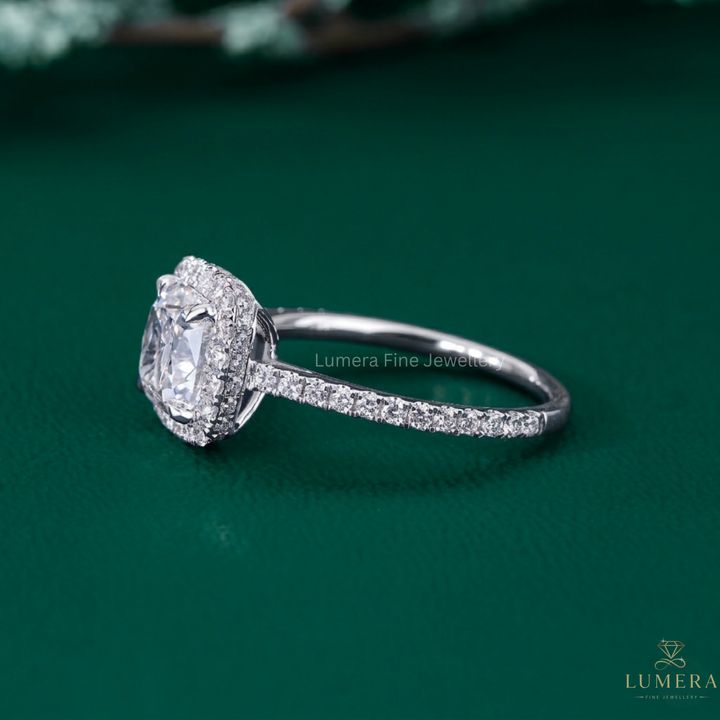 cushion cut engagement ring with cathedral setting ring.