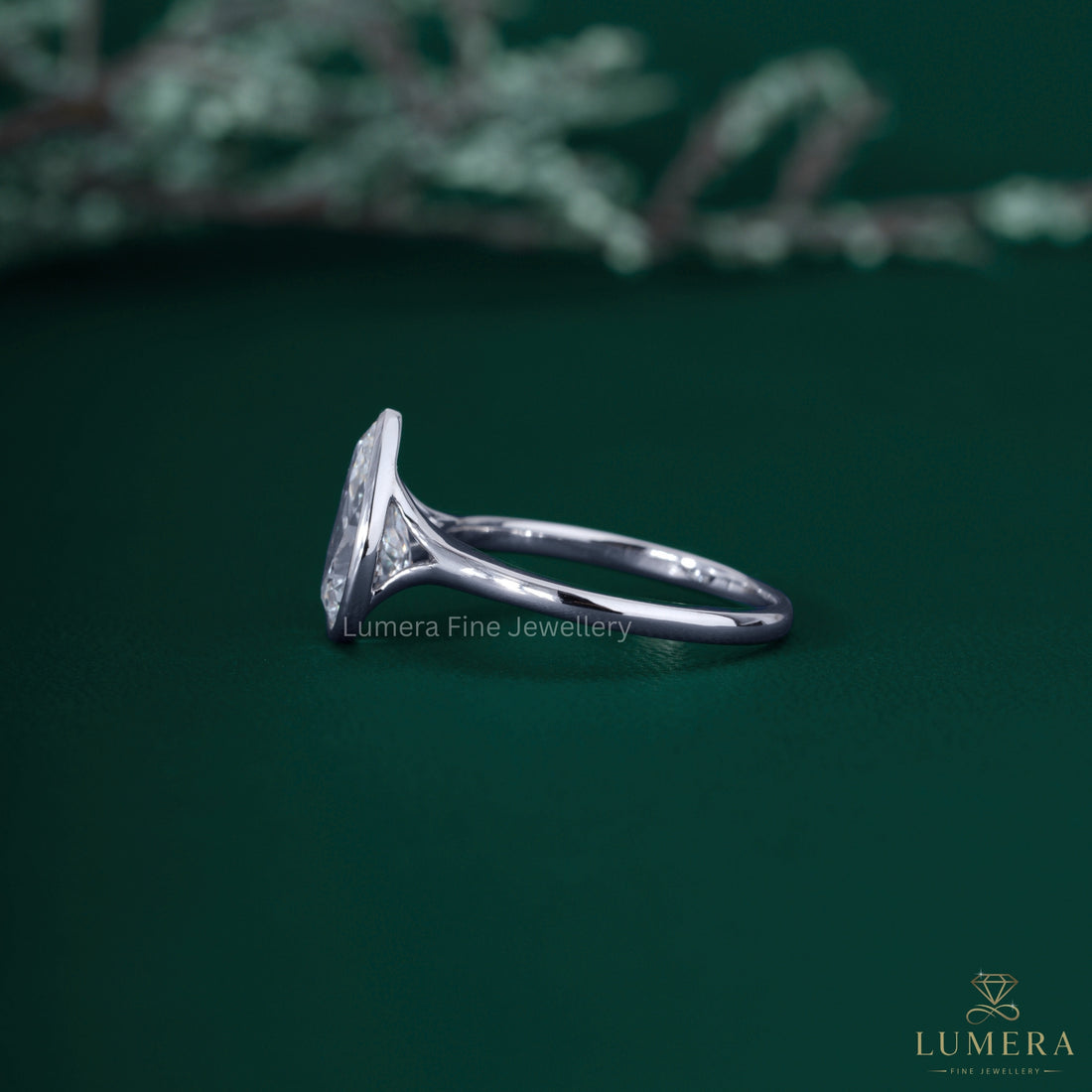 Pear cut engagement ring with pear diamond ring.