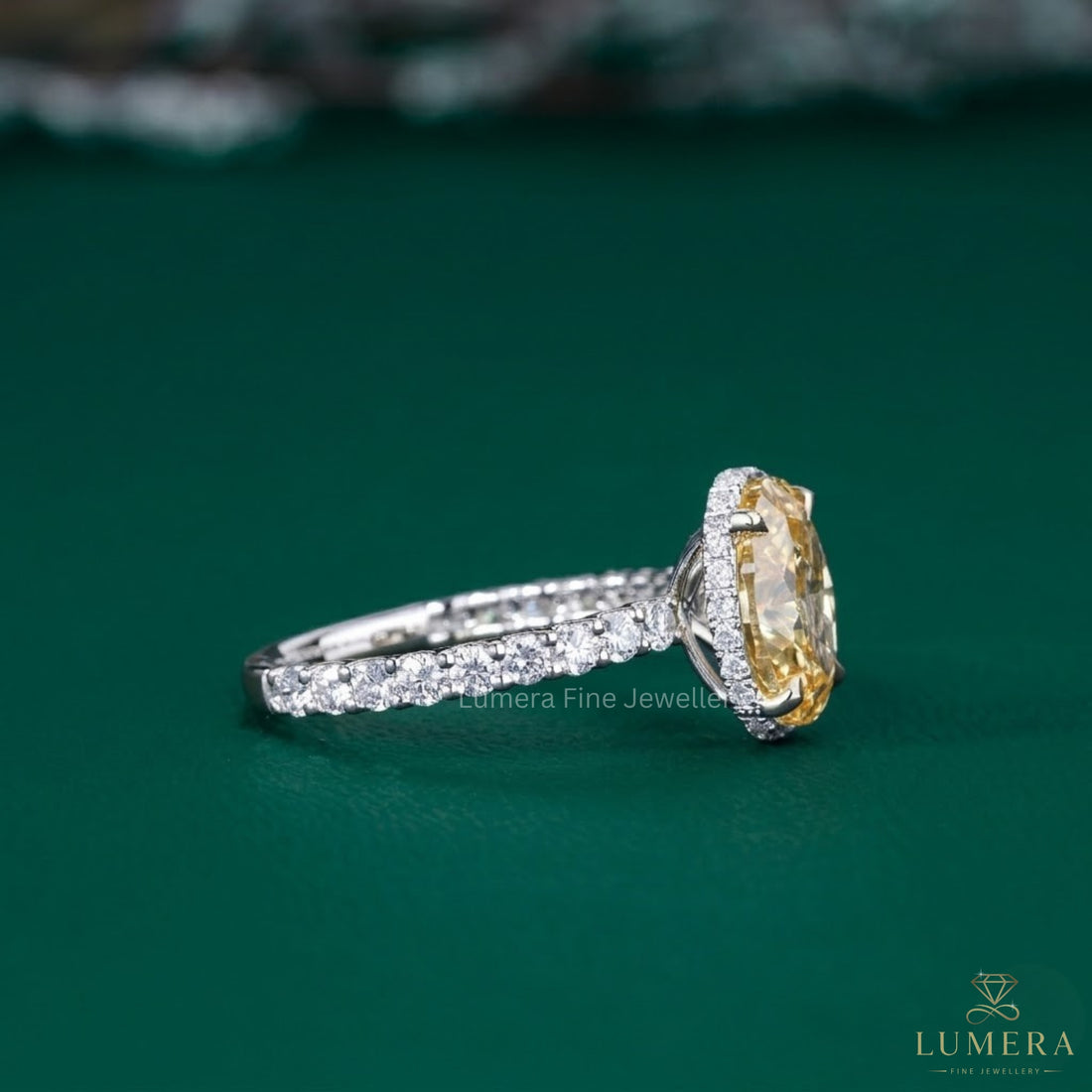 oval engagement ring with 4 prong engagement ring.