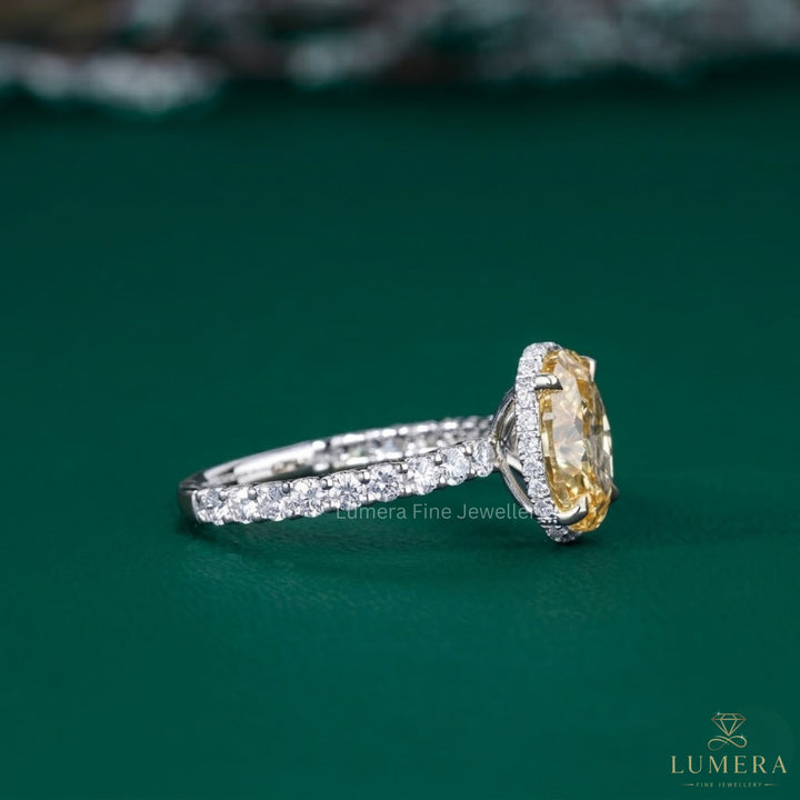 oval engagement ring with 4 prong engagement ring.