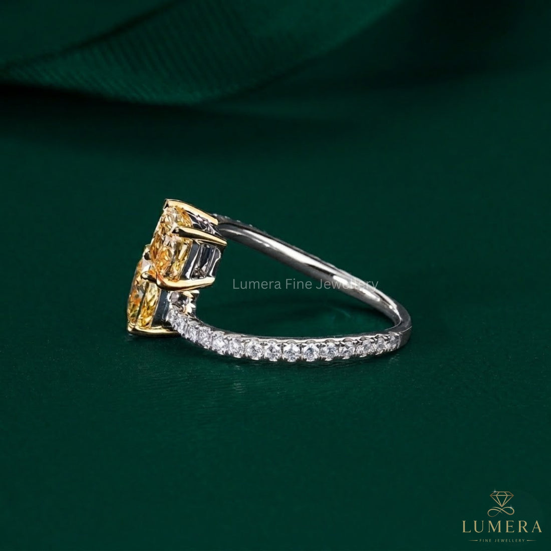 cushion cut engagement ring with two stone diamond ring.