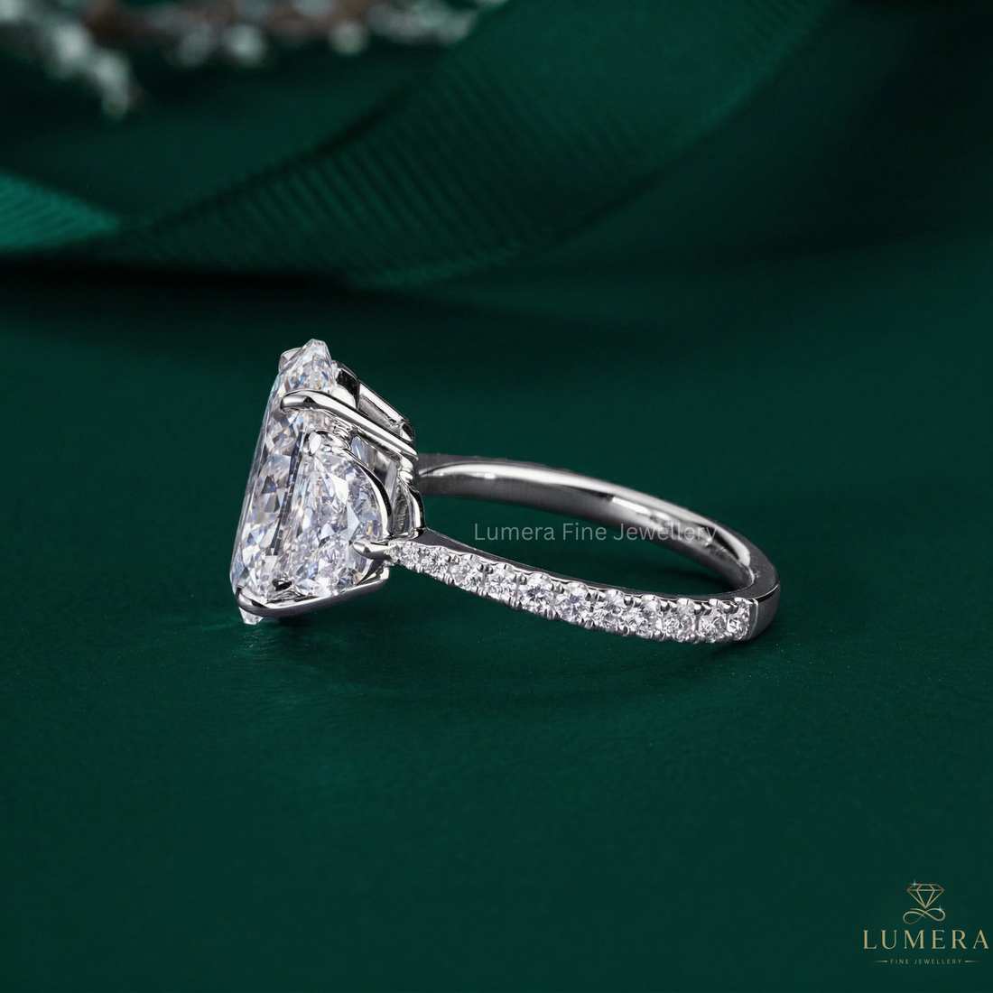 3 stone oval engagement ring on oval brilliant cut diamond ring.
