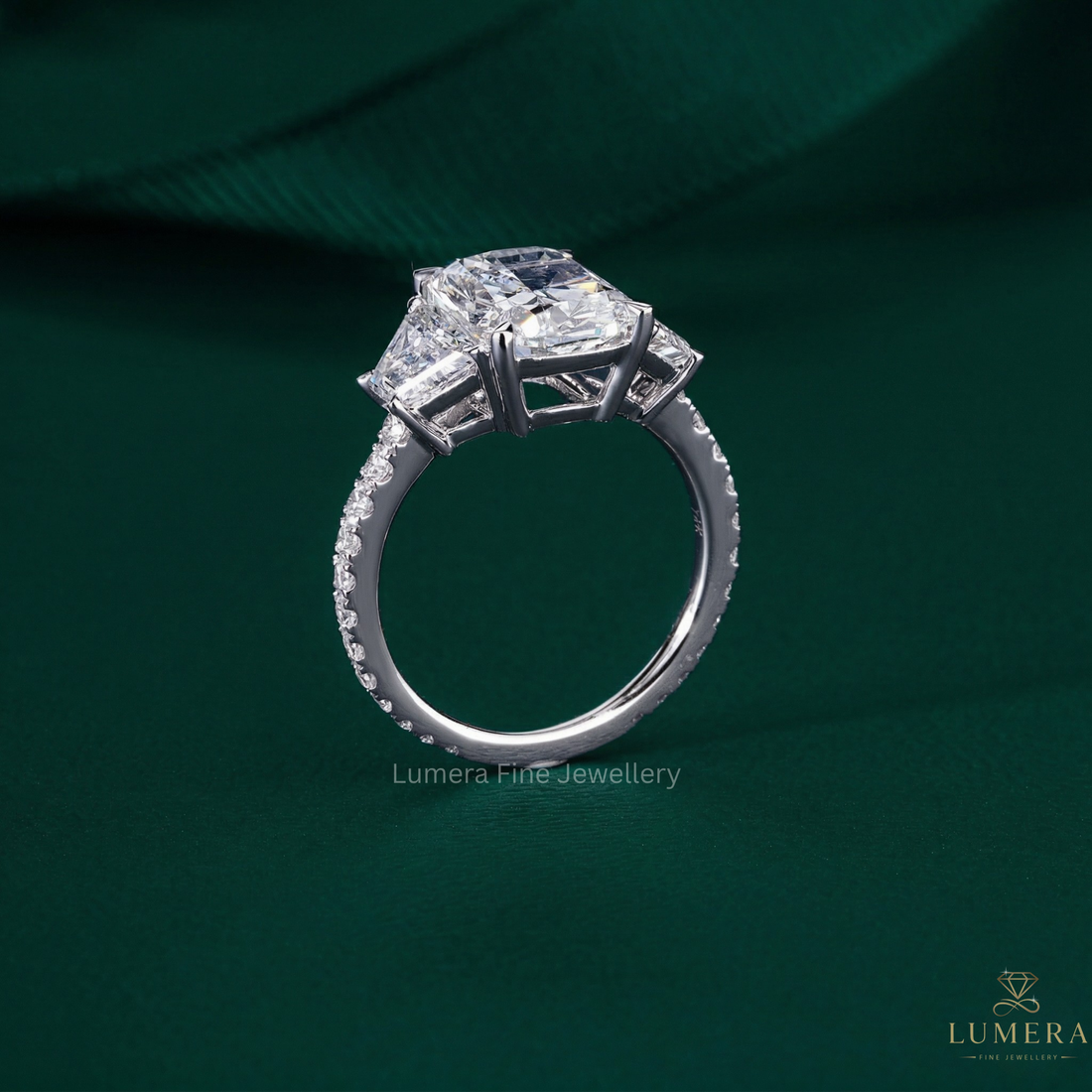 pave setting ring with cushion with trapezoid stone.
