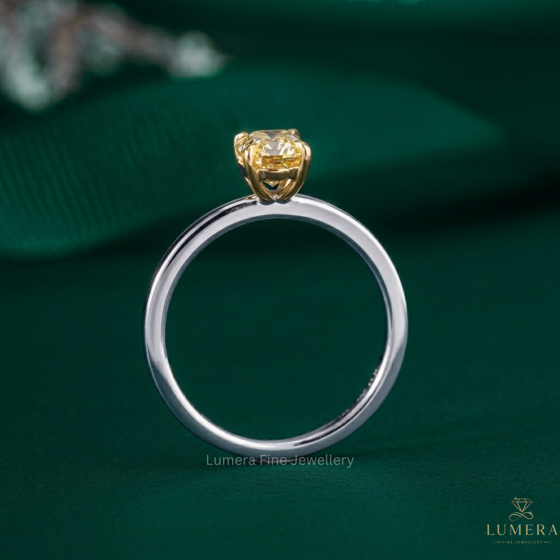 yellow stone ring in yellow diamond pear cut ring style.
