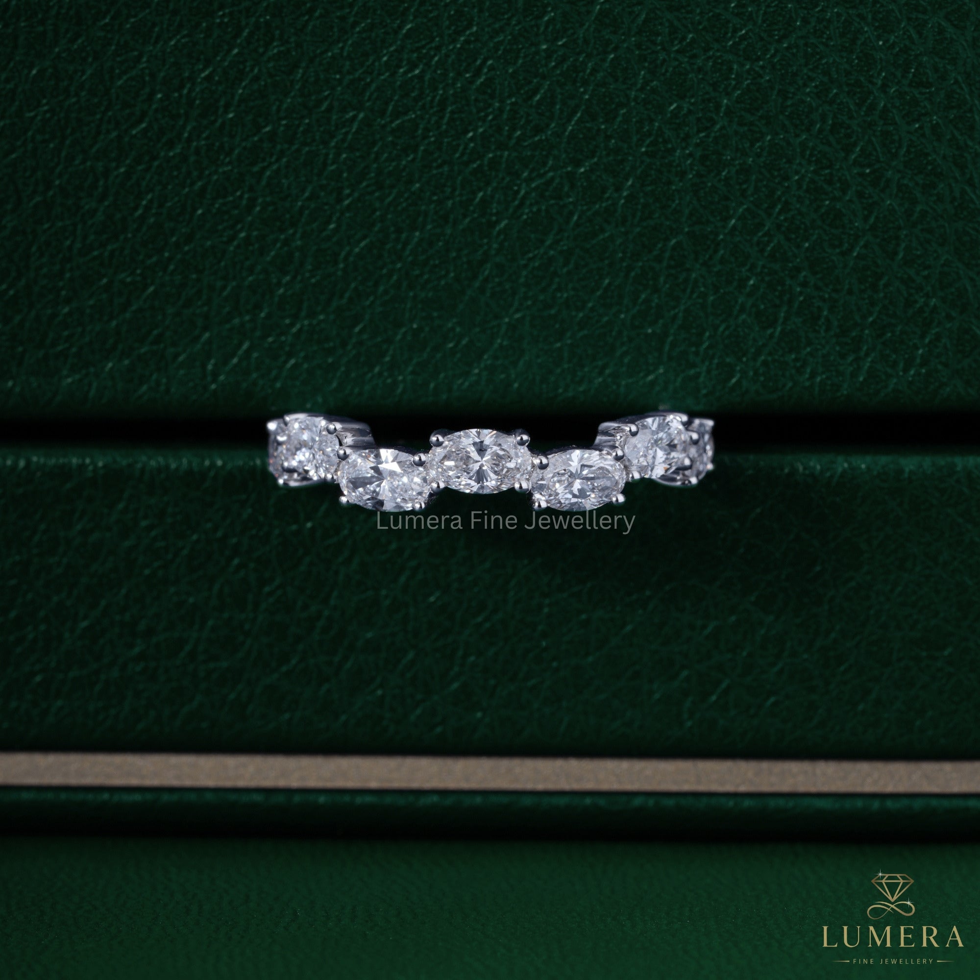 Oval diamond band with half eternity wedding band.