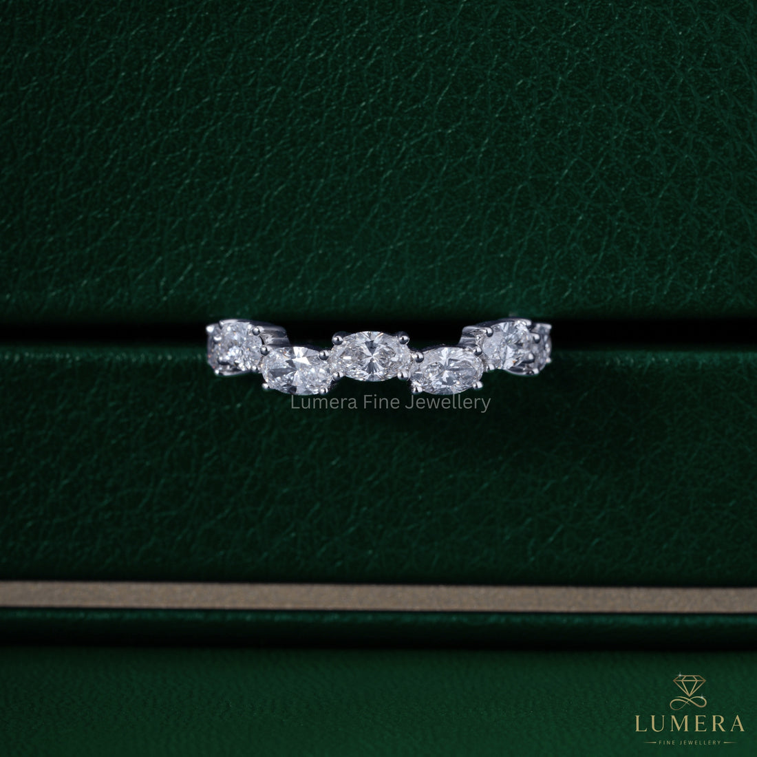 Oval diamond band with half eternity wedding band.
