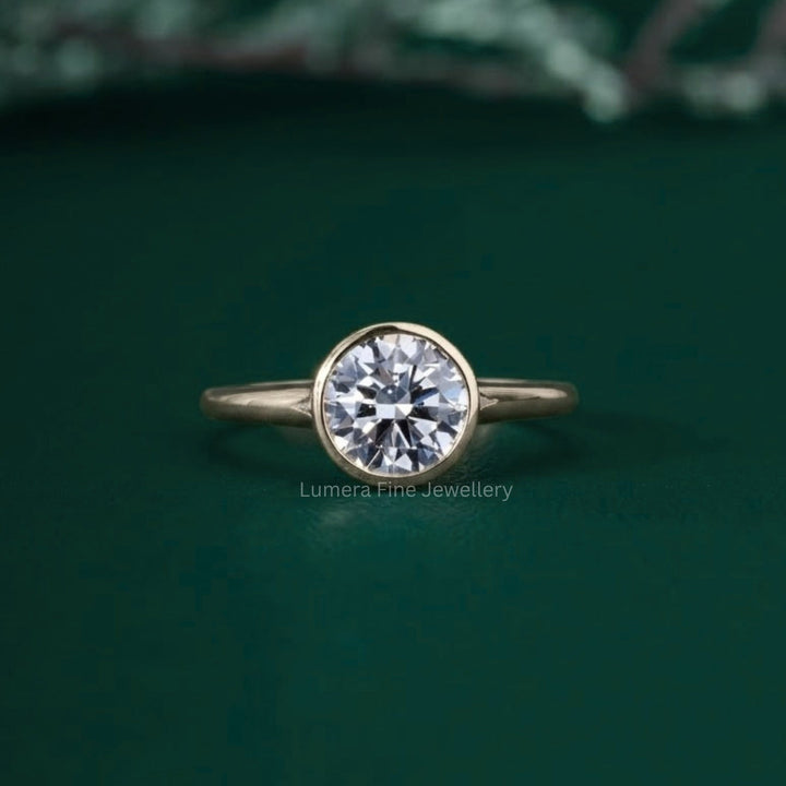 Bezel setting ring with round bezel diamond ring.
