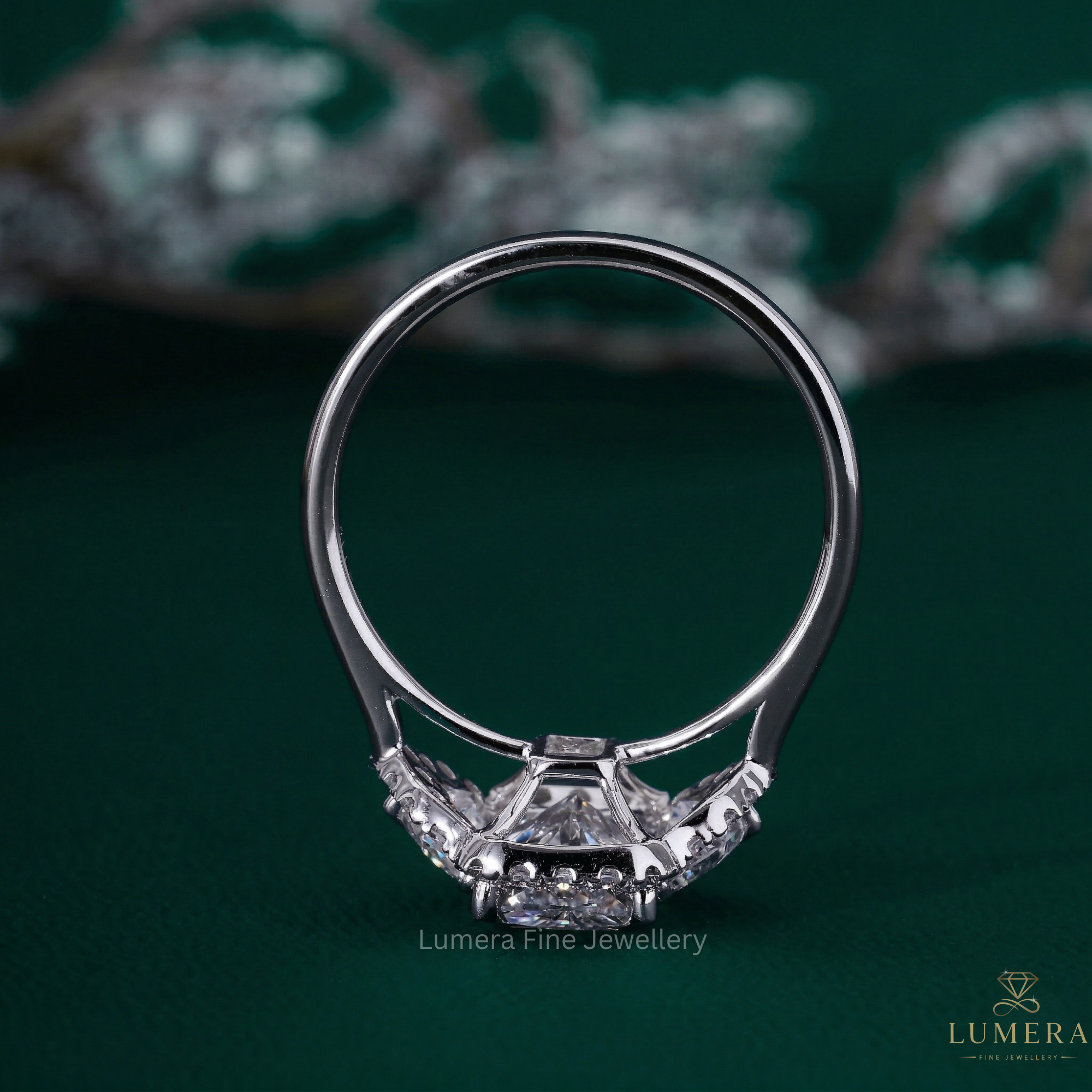 radiant diamond ring with Cadillac side stone.