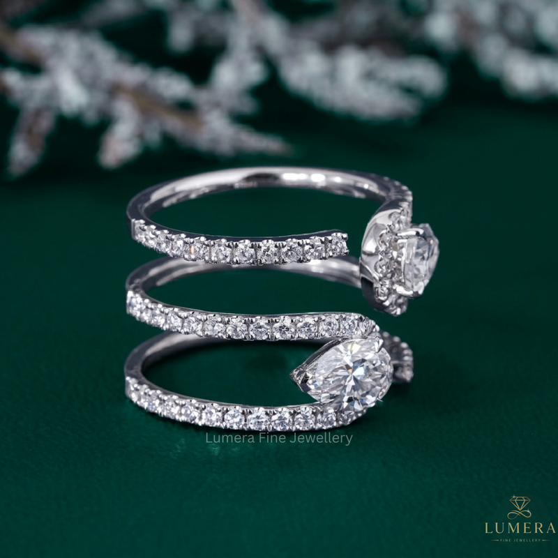 pear diamond band with two stone ring.
