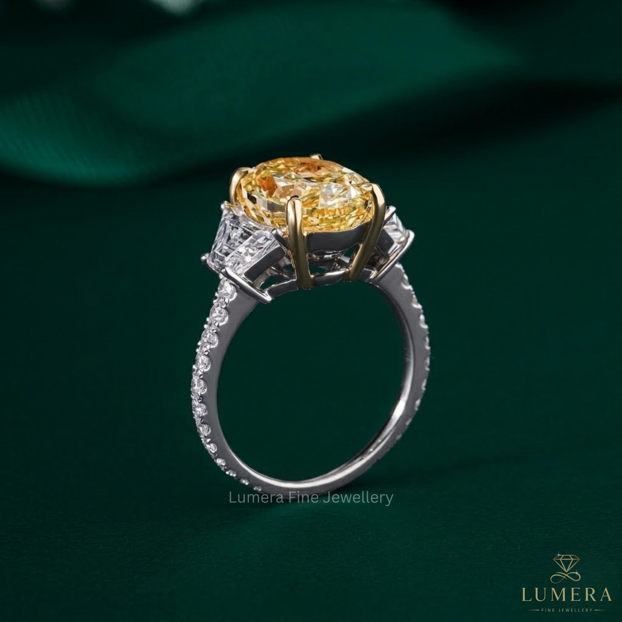 oval diamond engagement ring with basket setting ring.