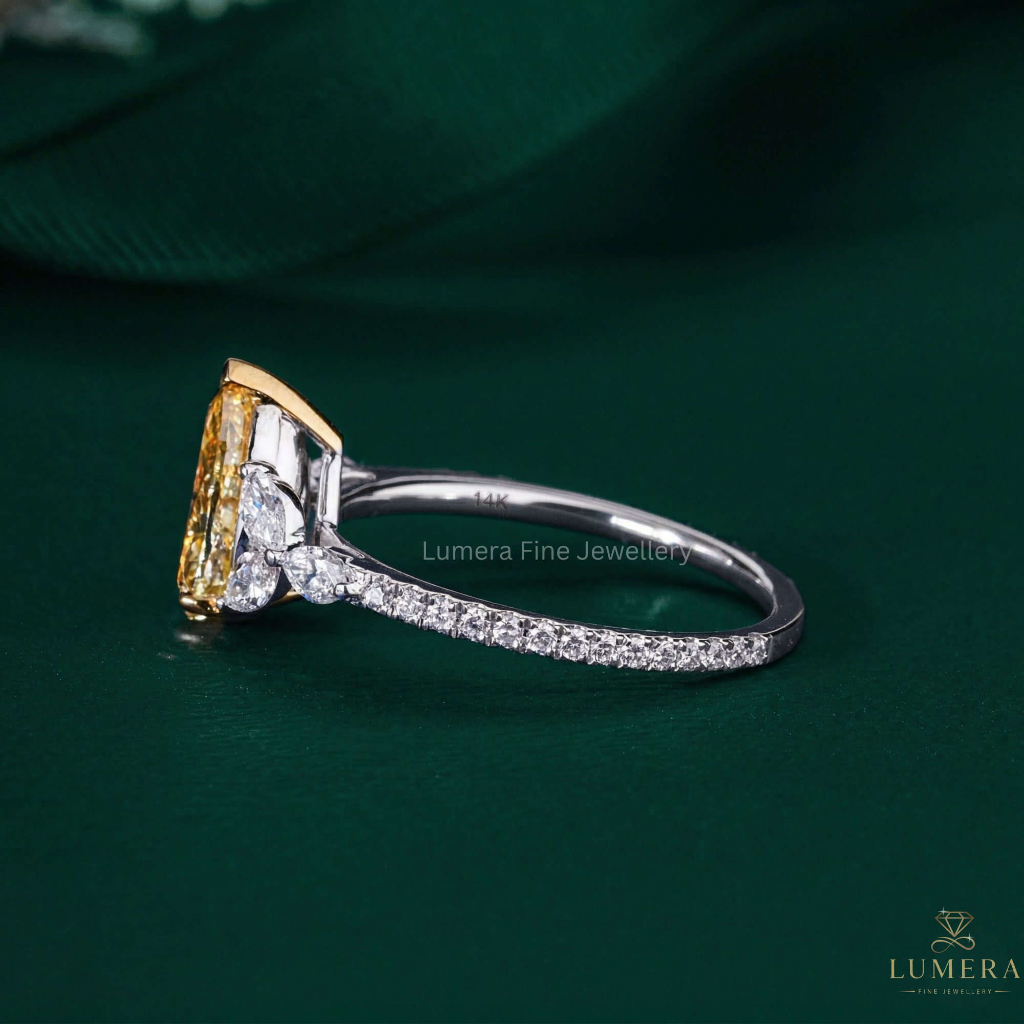 yellow pear diamond ring with yellow diamond ring.