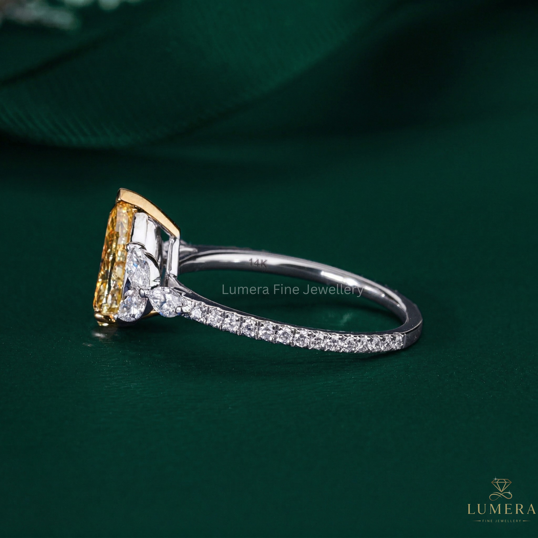yellow pear diamond ring with yellow diamond ring.