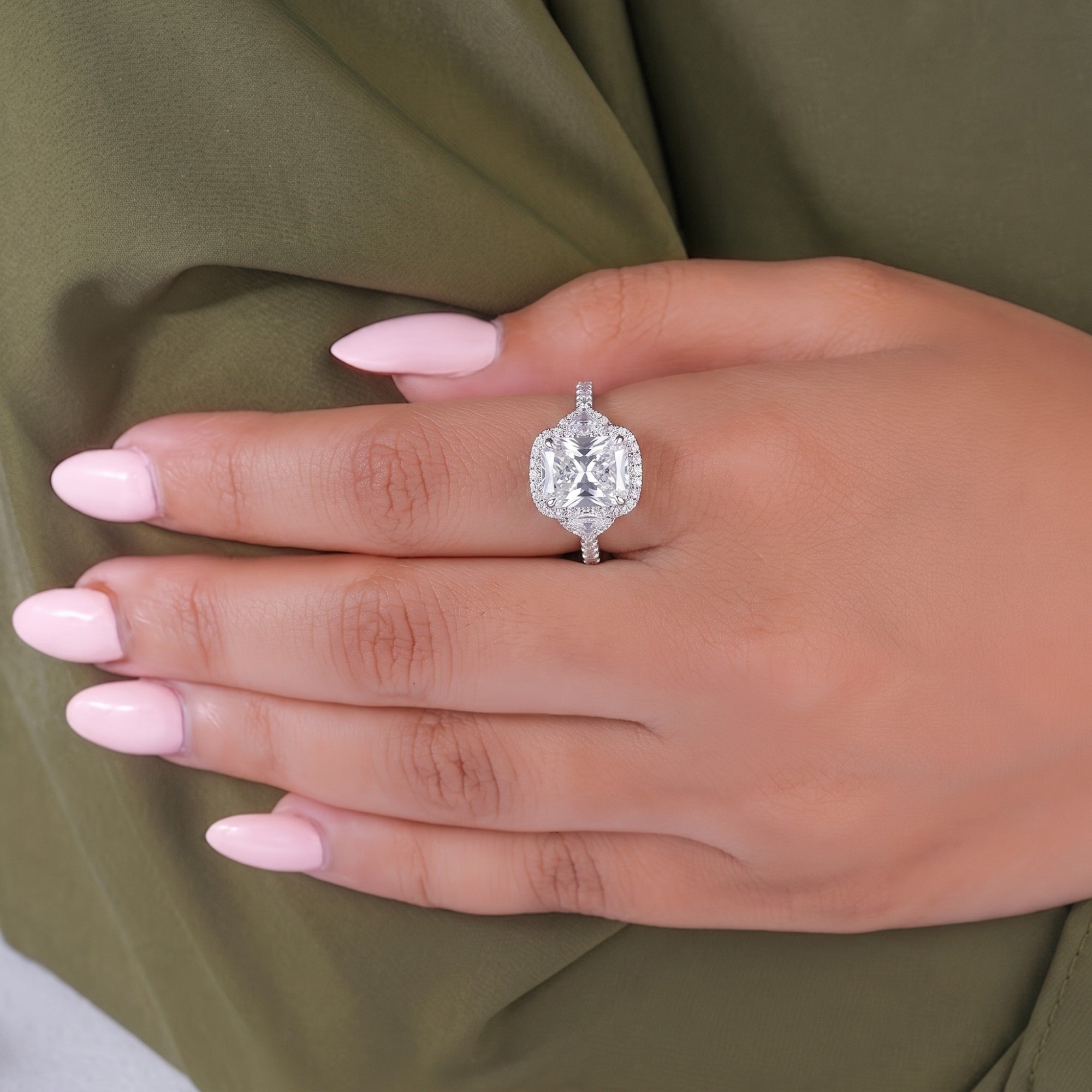 halo engagement ring with cathedral setting ring.
