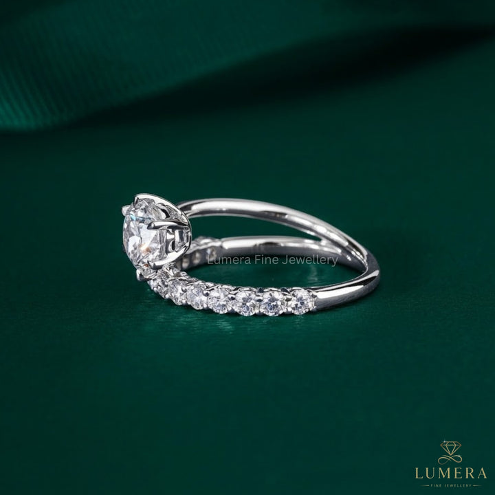 round cut ring with 6 claw prong.