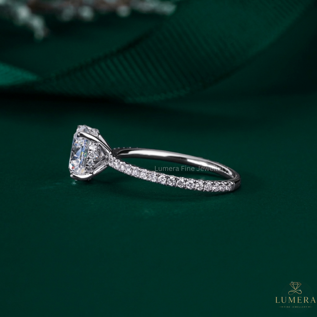 4 claw prong with solid gold ring.