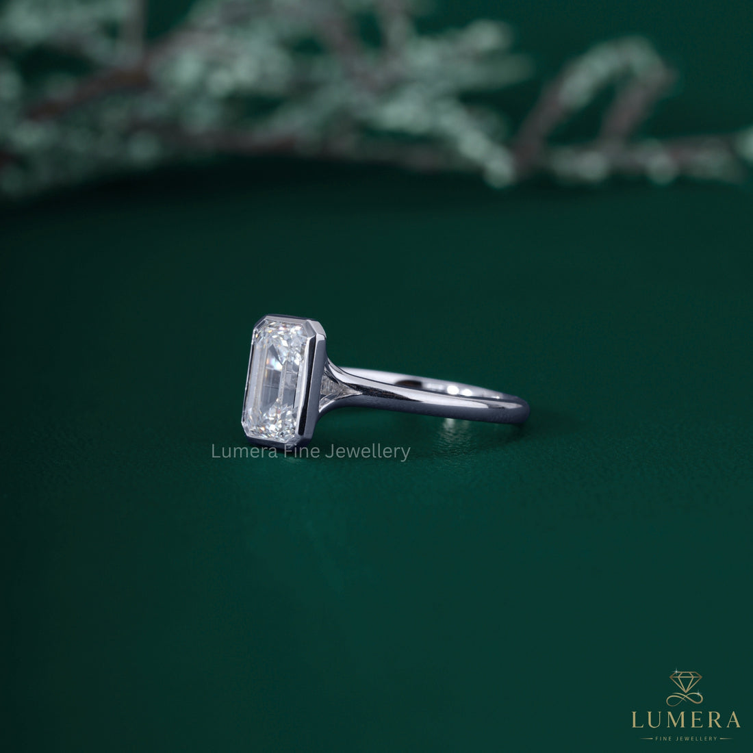 Emerald solitaire engagement ring with solitaire engagement ring.