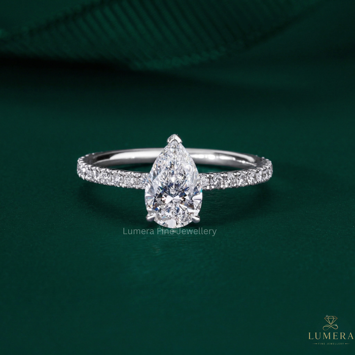 tear drop diamond ring with pear cut engagement ring.
