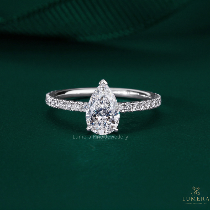 tear drop diamond ring with pear cut engagement ring.
