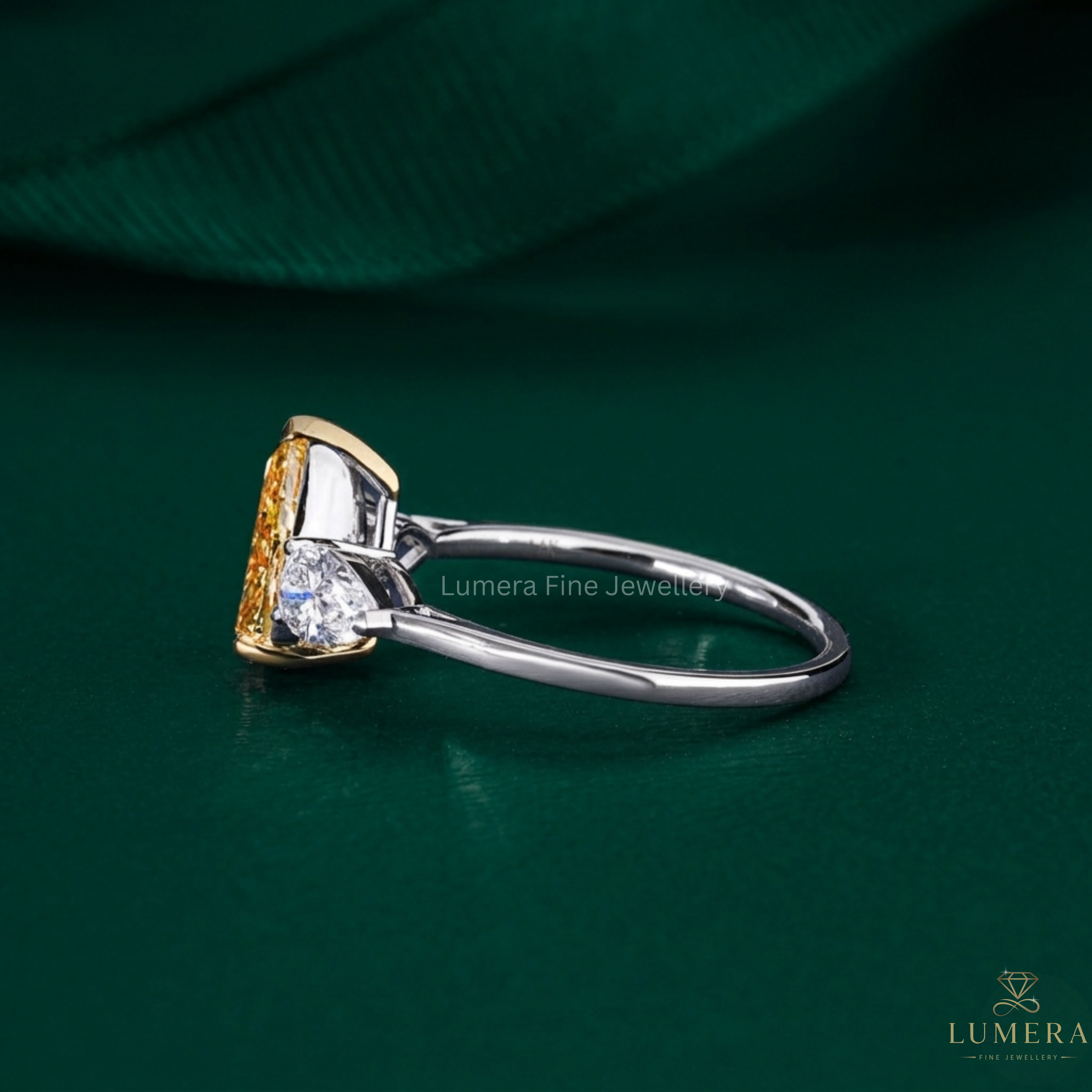 Pear diamond ring with Yellow diamond ring.