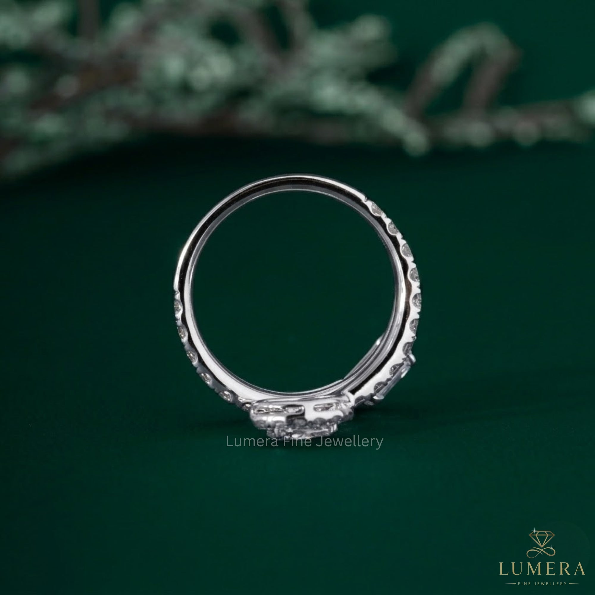 Oval diamond wedding band with solid gold band.