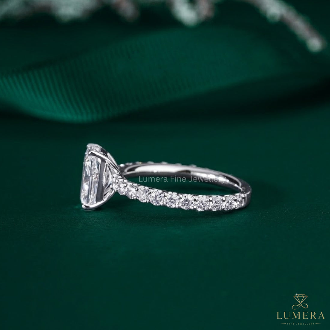 cushion cut diamond ring in pave setting band style.
