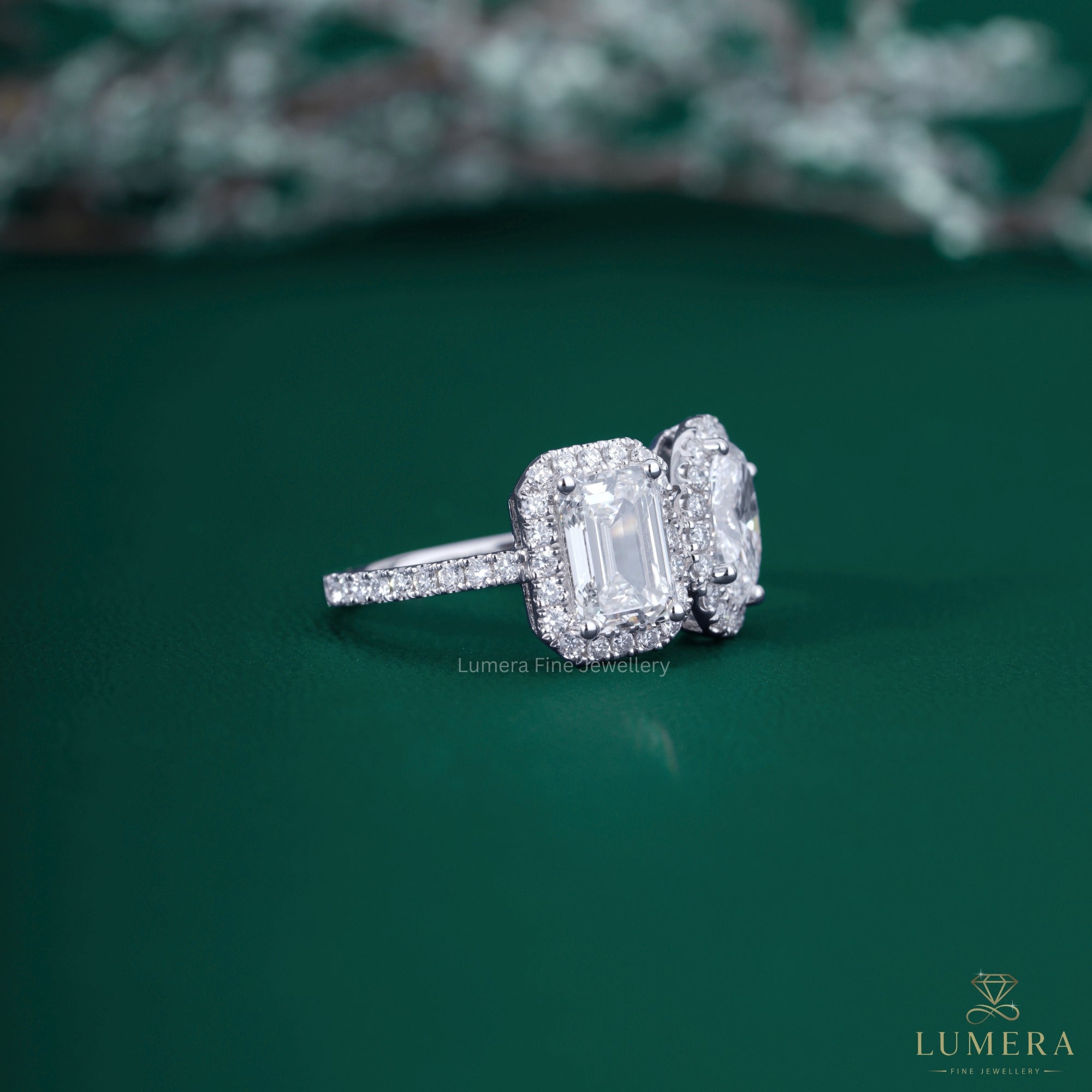 Emerald diamond ring with oval diamond ring.