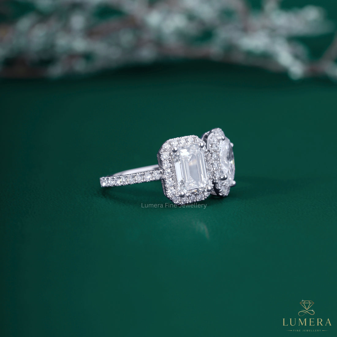 Emerald diamond ring with oval diamond ring.