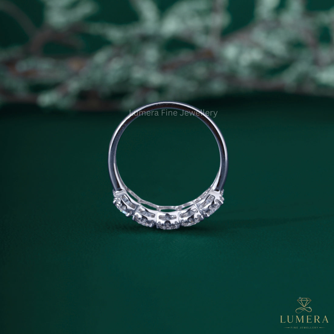 Round cut band with halo setting band.