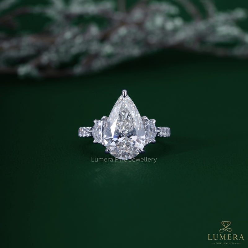Pear Shaped 3 Stone Diamond Engagement Ring In Pave Set