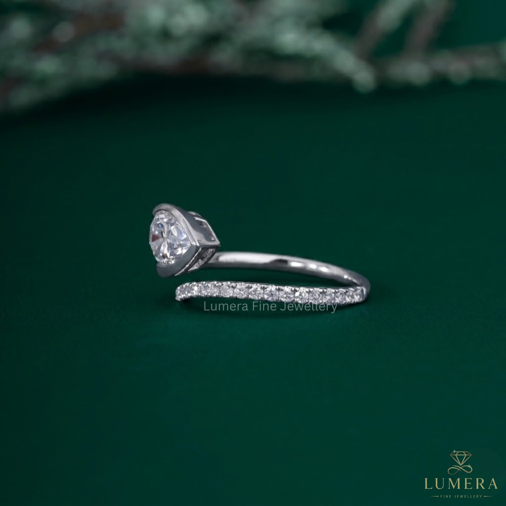 Solitaire accent ring with Pear bezel ring.