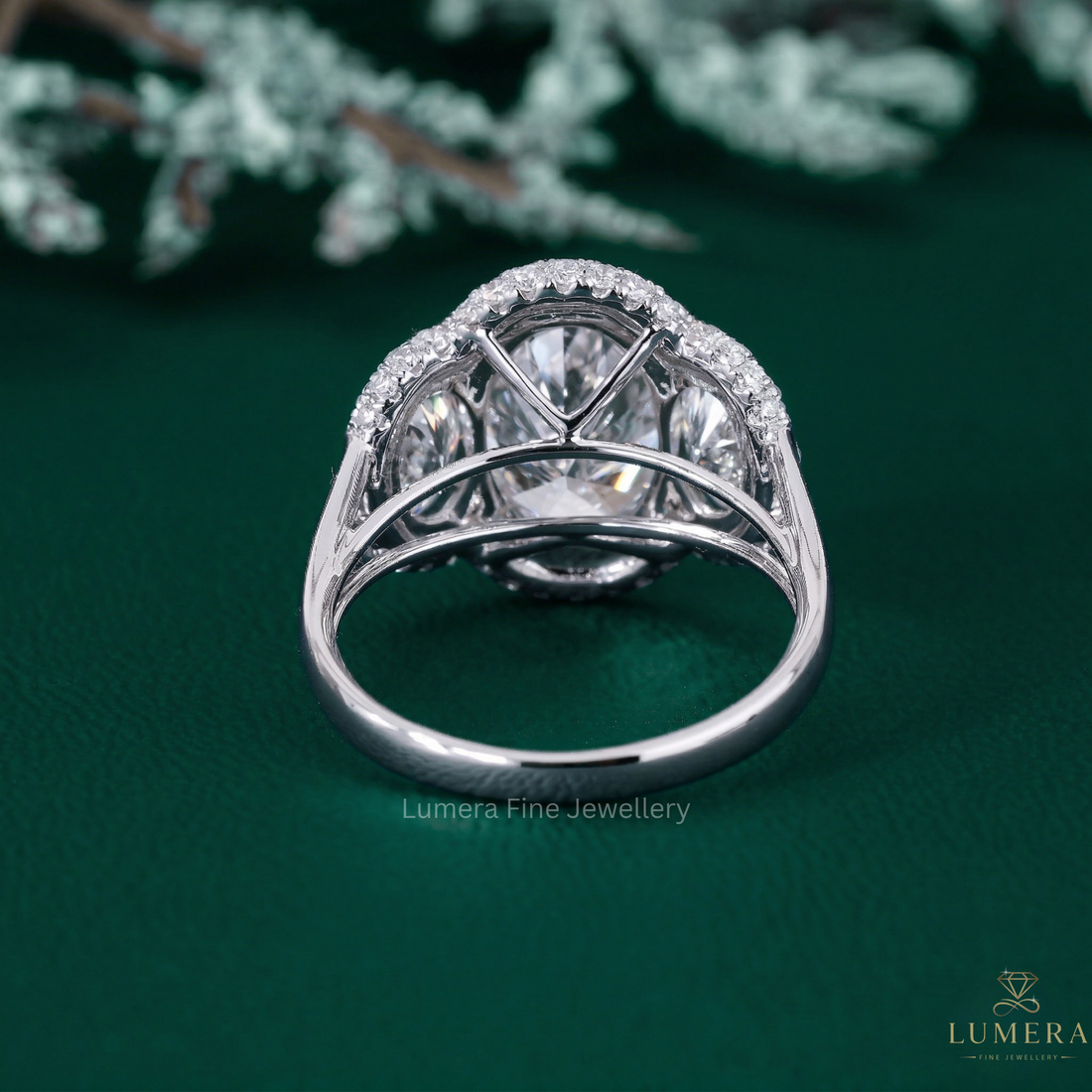 three diamond ring with three stone oval engagement ring.