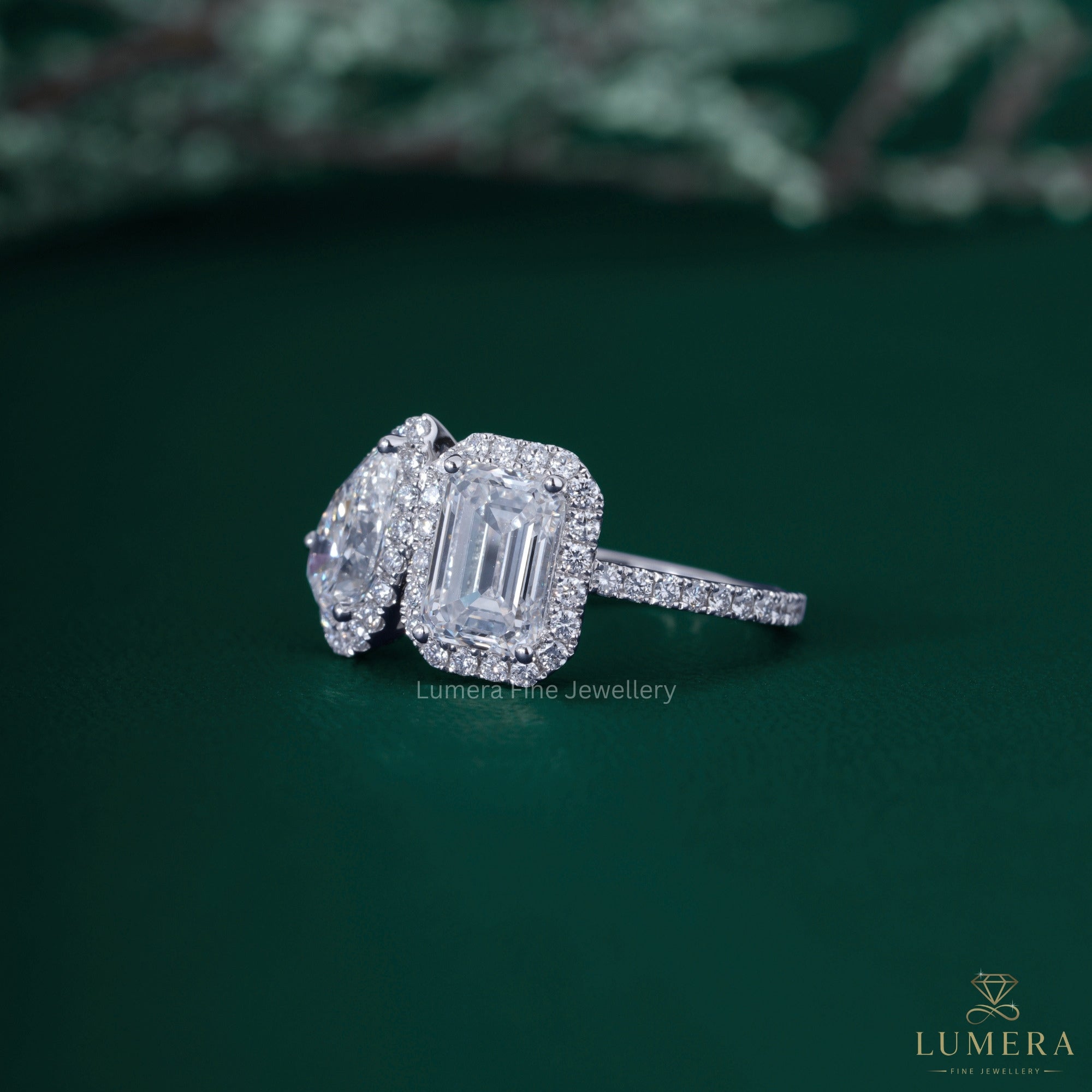 Pear engagement ring with almond diamond ring.