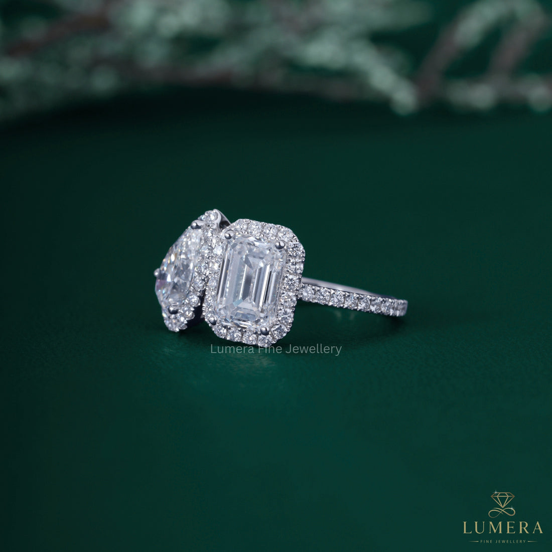 Pear engagement ring with almond diamond ring.