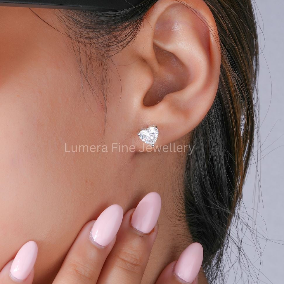 heart solitaire earrings with solitaire stud earrings.
