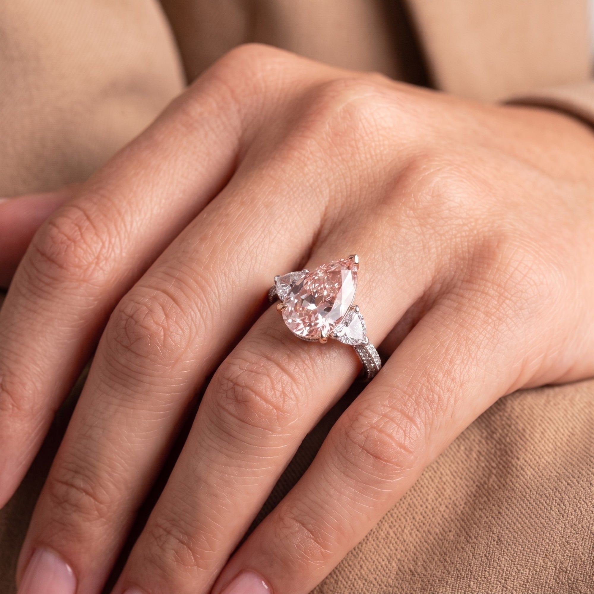 3 stone engagement ring with heart side stones.
