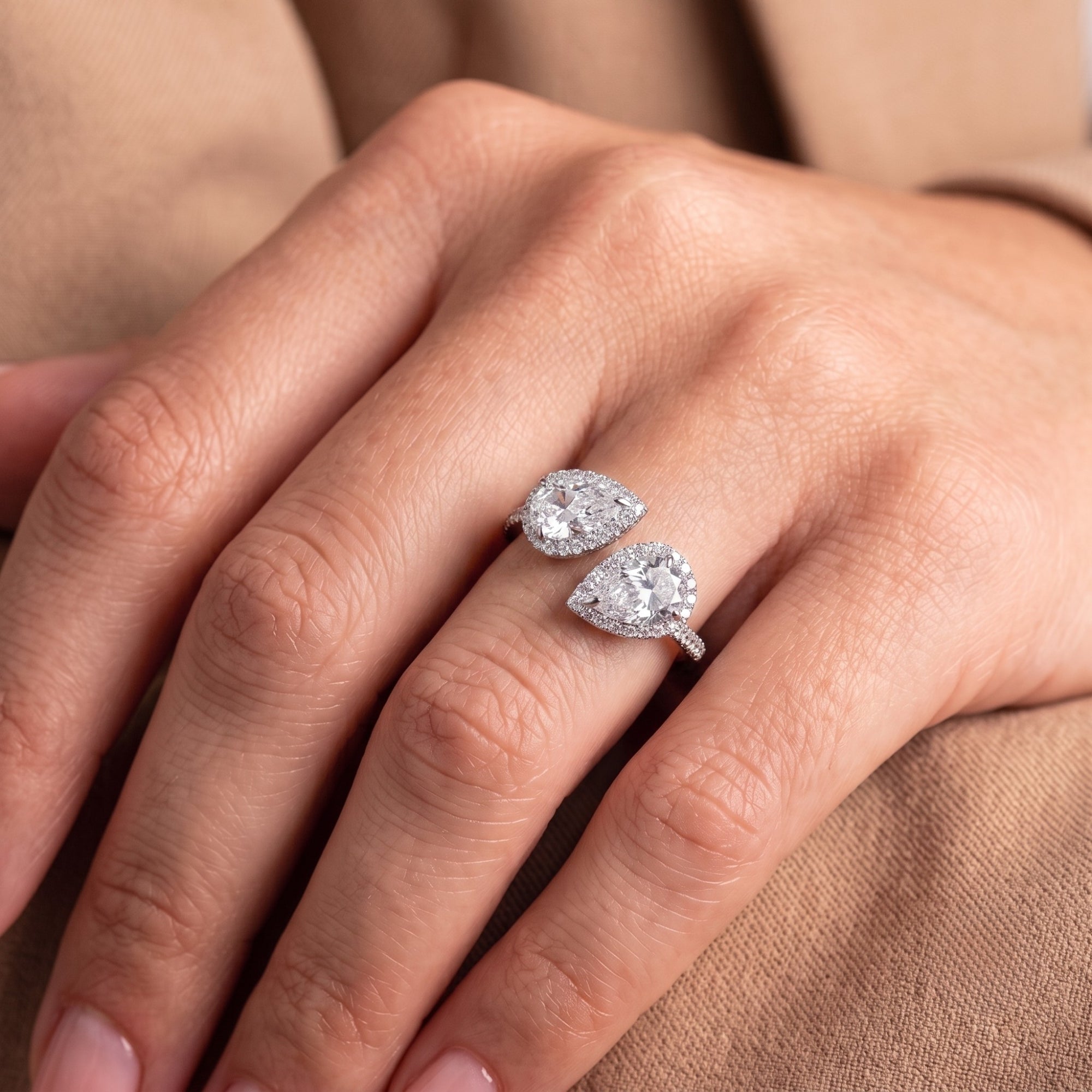 pear engagement ring with pear halo ring.
