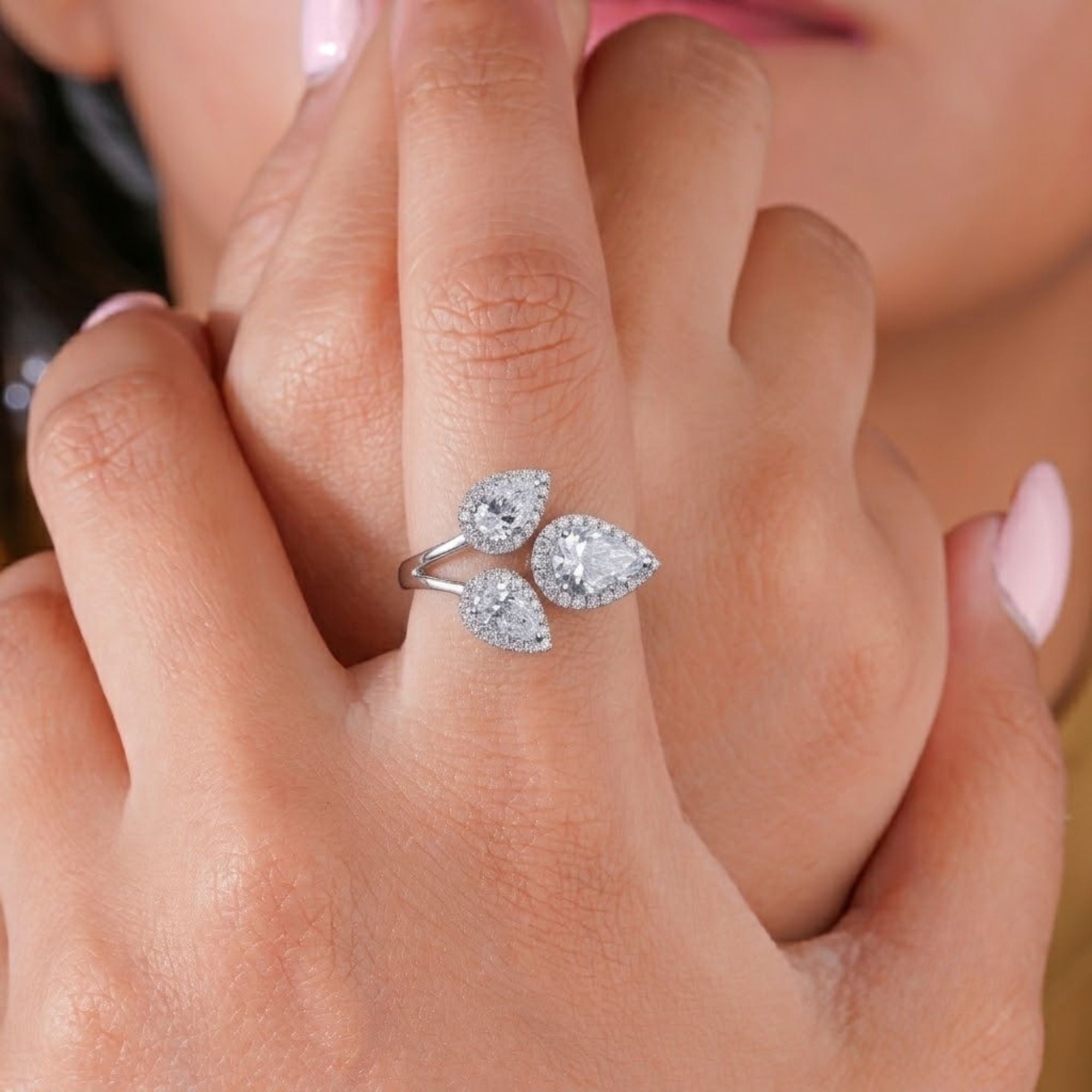 halo engagement ring with cathedral setting ring.

