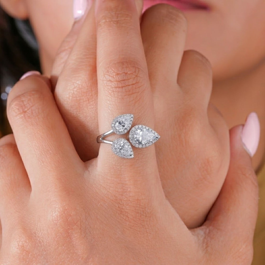 halo engagement ring with cathedral setting ring.
