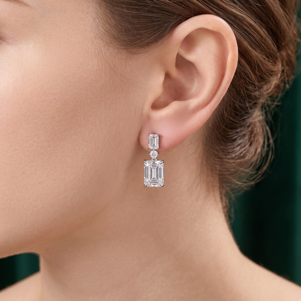 emerald and round cut earrings with dangle drop earrings.
