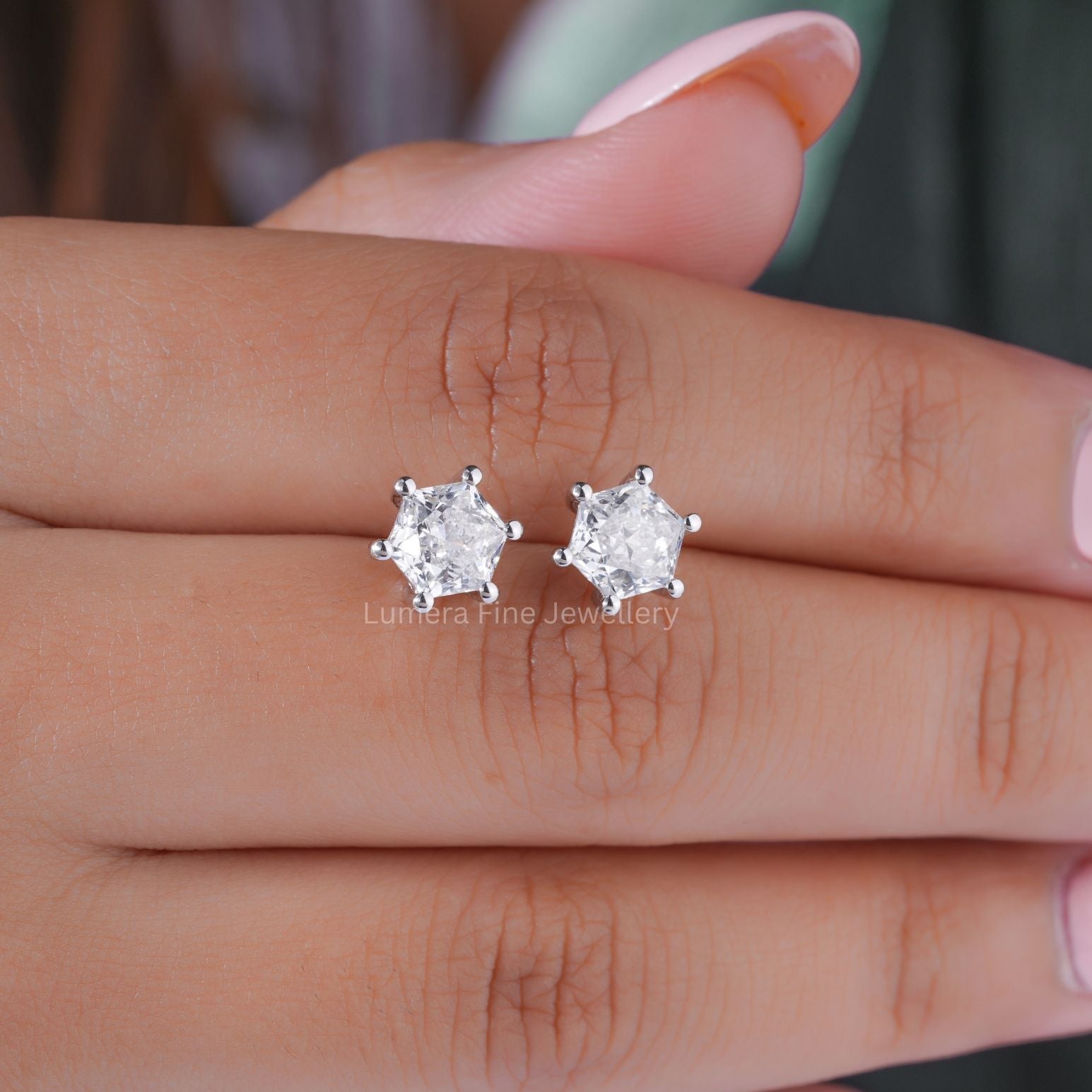 unique solitaire earrings with push back earrings.
