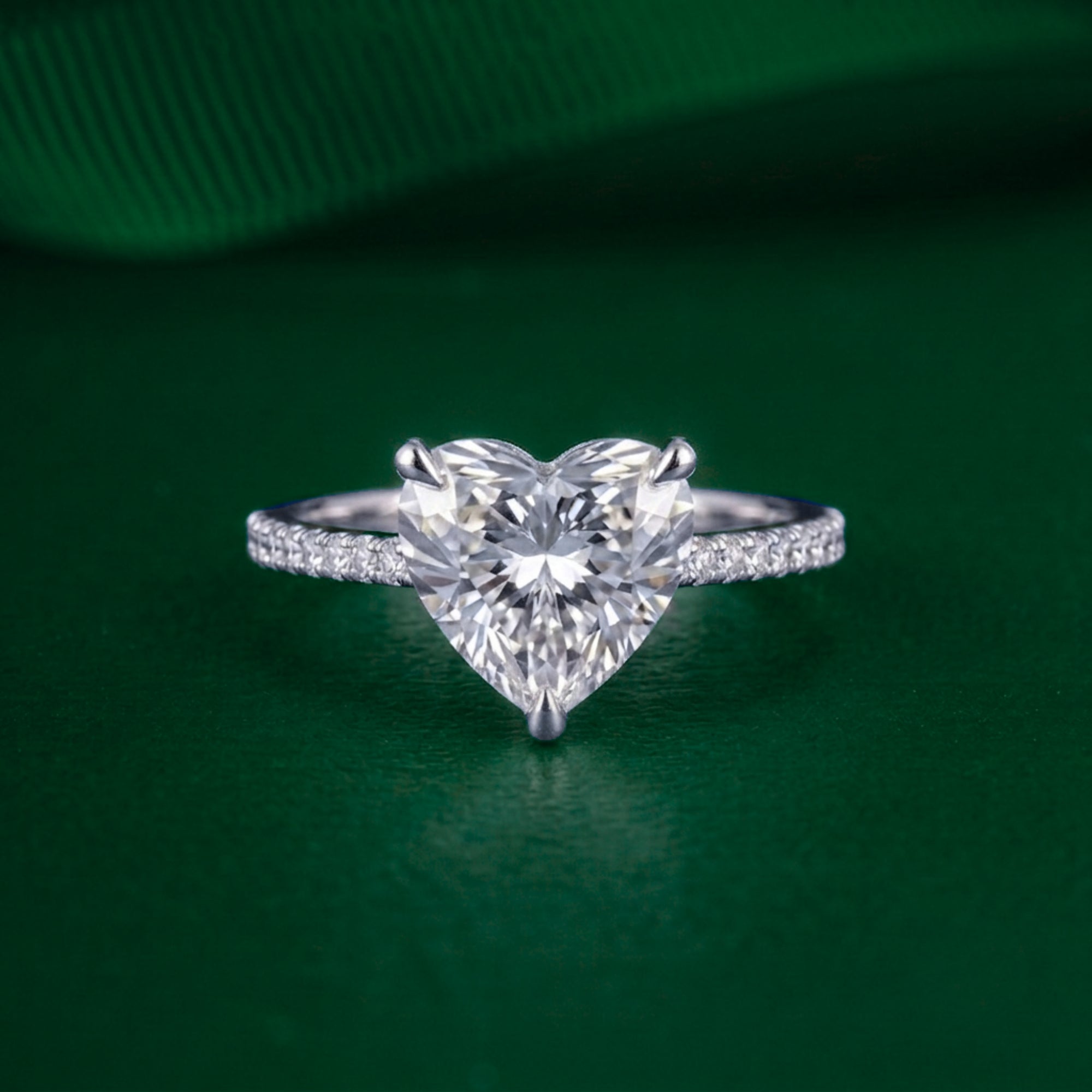 heart diamond engagement ring with cathedral setting ring.
