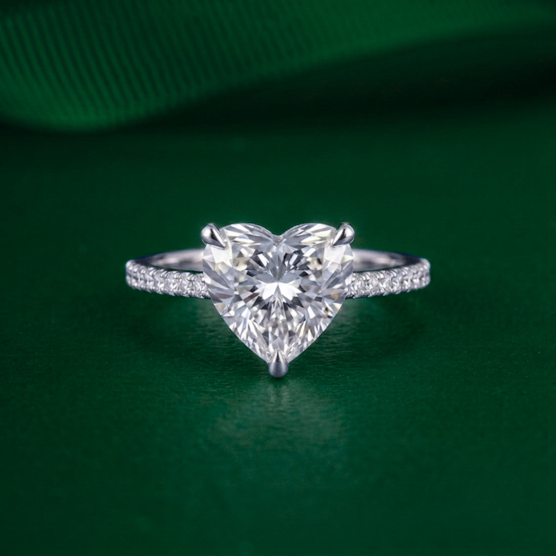 heart diamond engagement ring with cathedral setting ring.
