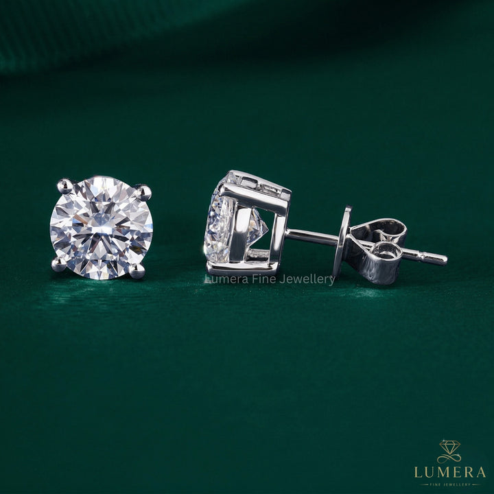 round cut earrings with round solitaire earrings.
