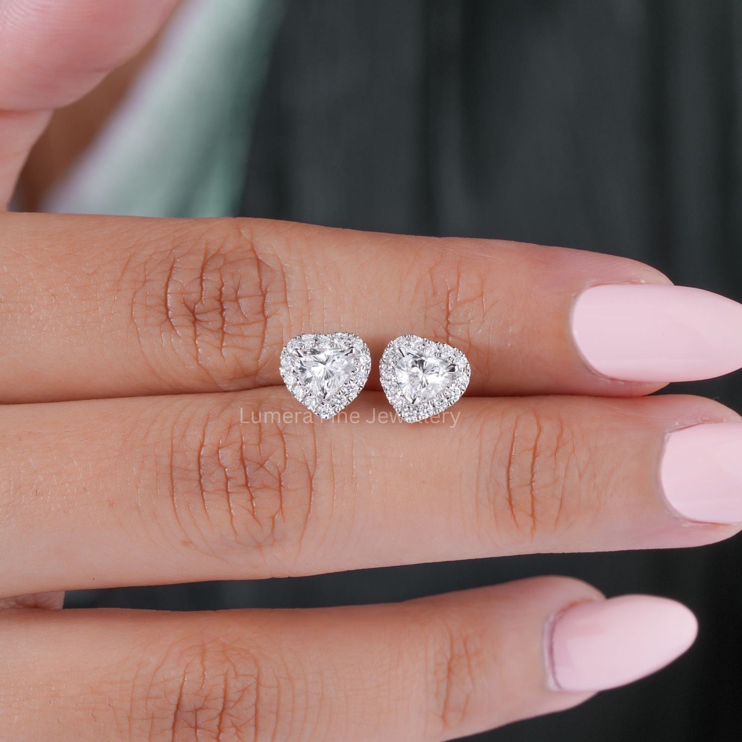 heart cut earrings with solid gold earrings.
